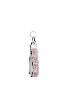 Find VICTORIA'S SECRET Wristlet Strap Keychain on Editorialist. This wristlet strap is a hands-free accessory for pouches or keys. It is 3” L x 6 3/4” H and can be attached to totes, backpacks, or used separately as a keychain. Vs Keychain, Victoria Secret Keychain, Girly Lifestyle, Strap Keychain, Keychain Holder, Christmas Idea, Xmas List, Girly Bags, Keychain Wallet