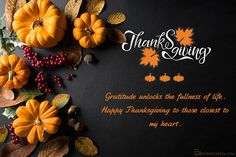 thanksgiving greeting card with pumpkins and leaves on black background, happy thanksgiving to my heart