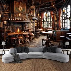 a living room filled with lots of furniture and walls covered in wooden paneled ceilings