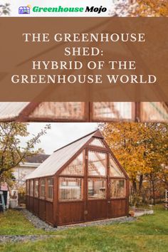 the greenhouse shed is in front of a green house with trees and grass around it