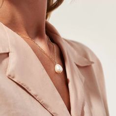 This dainty Tiny Pearl Necklace, adorned with small pearls on an 18k gold-plated chain, exudes understated elegance. Its delicate design makes it a versatile piece, perfect for subtle sophistication in any setting. Gold Pearl Pendant Necklace In 14k Gold Filled, Everyday Pearl Pendant Necklace, Chic Pearl Chain Necklace With Delicate Design, Chic Gold Pearl Necklace With Delicate Chain, Delicate 14k Gold Filled Pearl Drop Necklace, Elegant Everyday Pearl Drop Chain Necklace, Chic Gold Plated Pearl Chain Necklace, Delicate 14k Gold-filled Charm Necklace With Pearl Pendant, Everyday Chic Pearl Pendant Chain Necklace