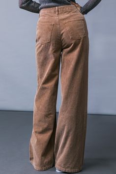 A corduroy pant featuring front closure, side pockets, wide leg and back pockets This season, make a statement in How Dare You Corduroy Pants. Crafted from luxuriously soft corduroy, these pants feature a front closure, side pockets and a wide leg cut that allows for maximum movement and comfort. Finer details include back pockets, adding a touch of sophistication to your look. Wear these pants to unlock a new level of class and style. Details Self : 75% Cotton 25% Polyester Size & Fit - Model i Corduroy Pant, Flying Tomato, Resort Collection, Swim Accessories, Swimsuit Cover, Sweatshirt Dress, Corduroy Pants, Baby Month By Month