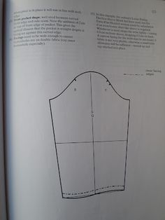 an open book showing the front and back of a dress pattern, with instructions on how to sew it