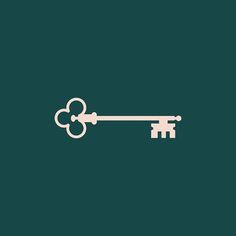 an image of a key with two keys attached to it on a dark green background