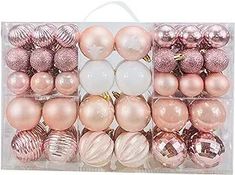 pink and white ornaments in a clear box