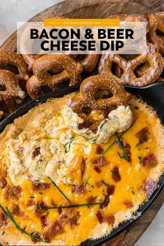 bacon and beer cheese dip in a cast iron skillet with pretzels on the side