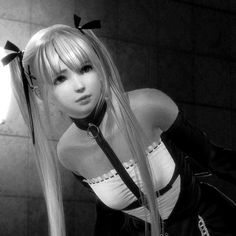 black and white photograph of a woman with long hair wearing a cosplay outfit