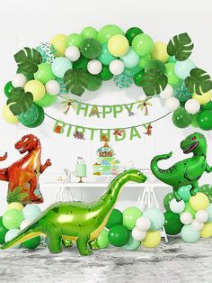 an image of a dinosaur birthday party with balloons