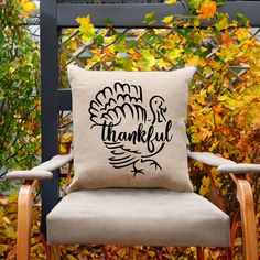 a chair with a pillow that says, thank you