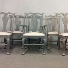 six chairs are lined up in front of a wall with the words supervisor interiors on it