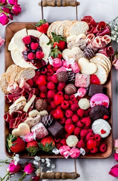 valentine's day charouette board with raspberries and chocolates