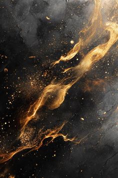 an abstract background with gold and black paint on the bottom half of it, as well as dark clouds in the middle