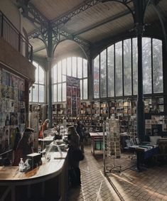 the inside of a book store filled with lots of books