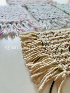 three different types of crocheted rugs laid out on a table