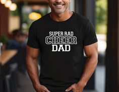 Cheer Dad Shirt. Super rad cheer dad. Funny cheer dad shirt. Our shop offers a little something for everyone, featuring the buttery soft Bella Canvas shirts, 100% cotton classic fit Gildan, A4 Cooling Performance shirts ensures crafted from 100% polyester, as well as Gildan Crewneck Sweatshirts. More details found below. 💙SIZE, COLOR & STYLE (for detailed sizing information, please see listing images) 🔵GILDAN SHIRT ➡ Gildan Heavy Cotton T-Shirt | Classic Fit Unisex Crew Neck  ➡Adult Shirt Size Dad Tshirt, Tshirt Funny, Gildan Sweatshirts, Adulting Shirts, Heat Transfer Vinyl