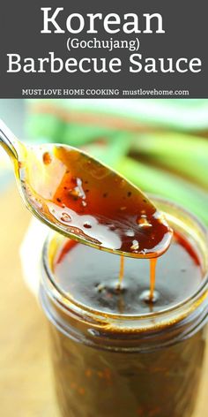 a spoon full of korean barbecue sauce on top of a wooden table with text overlay