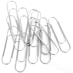 several metal clothes pins lined up in a row on top of each other, with one standing out from the rest of the pack