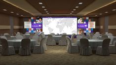 a large conference room set up with white linens and round tables covered in tablecloths