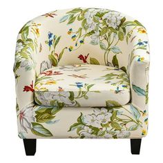 an upholstered chair with flowers on it