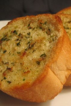 two pieces of bread that are on a plate