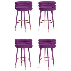 four purple velvet bar stools with brass legs and back rests on a white background