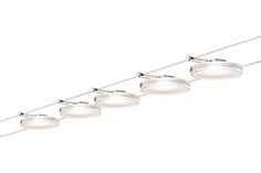 five lights are hanging from the ceiling in a row, with one light on each side