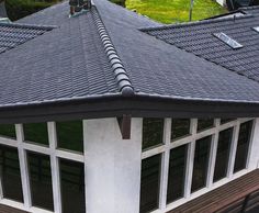 the roof of a house with several windows