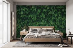 a bedroom with green leaves on the wall