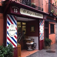 a barbershop with red, white and blue stripes