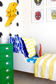 a child's bedroom decorated in bright colors