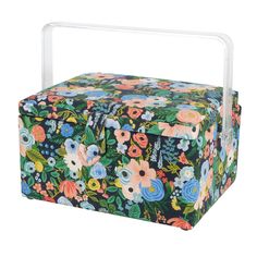 an image of a flowered box with handles on the lid and handle for storage