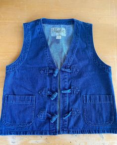 The cutest vintage denim vest with two front square pockets and three large toggle closures  100% cotton  Tag reads size small fits small and medium By Solanza Vintage Denim Vest, Vest Outfits, Denim Vest, Womens Vest, Vintage Denim, Clothes For Women, Blue, Clothes