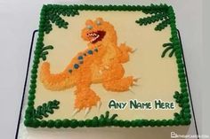 a birthday cake decorated with an image of a dinosaur