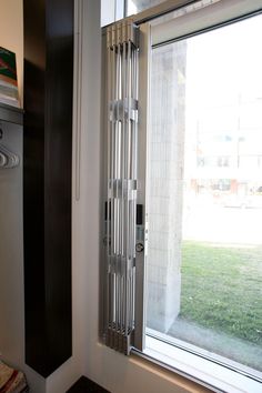 a room with a radiator next to a window