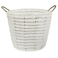 a white basket with brown handles