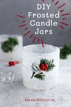 diy frosted candle jars with holly and mist on them for christmas or holiday decor