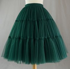 When buying, please tell me the last time I need a skirt, thank you! A tulle skirt with an elastic waist is suitable for women of any size. Purchase guide Waist: choose the actual waist Length: measurement from waist to the part you need!(Refer to the last picture for measurement) Color: leave a note for us the color and color number About Orders  If the waist is over than 40 inches, please choose the custom make !  If the length is over than 25.5inches, please choose the custom make ! If the le Vintage Gathered Skirt For Wedding, Vintage Party Skirt With Attached Cancan, Vintage Wedding Skirt With Gathered Details, Vintage Ruffled Skirt For Party, Vintage Tiered Skirt For Party, Vintage Party Petticoat With Ruffled Skirt, Vintage Full Tulle Skirt Petticoat, Fitted Vintage Tulle Petticoat, Vintage Tiered Petticoat With Lined Skirt