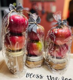 apples are wrapped in clear cellophane to look like they're ready for the holiday season