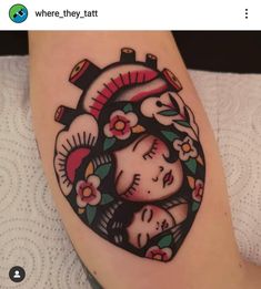 a woman's leg with a tattoo design on it