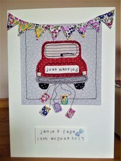 a wedding card with a red bus and bunting on the front, just married