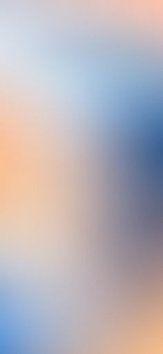 blurry image of an orange and blue background