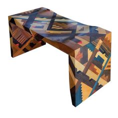 an artistic wooden table with geometric designs on it