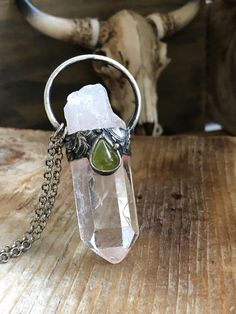 This necklace is crafted from a Tibetan Quartz with a unique clarity and energy that can be felt just by looking at it. The quartz is adorned with a beautiful peridot gemstone, peridot symbolizes purpose and focus, and is revered for its good luck vibes and ability to instill a sense of calm and safety. Himalayan Quartz works like any other quartz crystal, except for the energy it releases. It is said to contain the wisdom and esoteric knowledge of ancient Tibet. Tibetan Quartz has a powerful, f Esoteric Knowledge, Tibetan Quartz, Himalayan Quartz, Vibrational Energy, Emotional Body, Ancient Knowledge, Power Crystals, Peridot Gemstone, Boho Stil