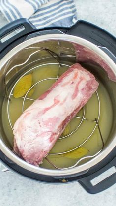 the meat is being cooked in the pot on the stove top, and it's ready to be cooked