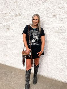 Take me to the rodeo or lose me forever! Live a wild western adventure with our Take Me To The Rodeo Tee Dress! This 100% Cotton jersey dress will give you an authentic western look with an irresistible soft feel. Plus, you'll be proud to know it's made in the USA. Embrace the spirit of the rodeo today! Styling Tip: Pair with a concho belt and fringed fanny for the perfect traveling bandita fit! Rodeo Dress Outfits For Women, Western Tshirt Dress, Edgy Western Style, Rodeo Dress, Rodeo Outfit, Shower Outfits, Cotton Jersey Dress, Rodeo Outfits, Style Inspiration Casual