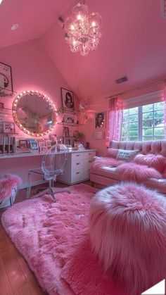 a room with pink carpet and furniture in it, all lit up by lights on the ceiling