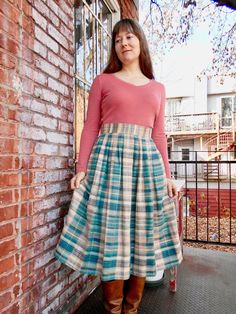 The soft pastel colours of this lovely linen skirt are sweet and romantic - perfect for spring/summer. The skirt is pleated all around for a full look. Includes two pockets at the hips. Closes with a zipper and two buttons at the center back. The skirt is unlined. There is a very wide 3.5" hem, so skirt could be lengthened if desired. Plaid consists of tones of teal, sea green, cream, and taupe with touches of pink, yellow, lavender, dark blue and periwinkle throughout, the fabric is high qualit Pink And Green Plaid Skirt, Teal Plaid Skirt, Pastel Purple Plaid Skirt, Retro Full Plaid Skirt, Retro Plaid Lined Skirt, Pastel Plaid, Skirt With Pockets, Cream Blush, Brown Plaid