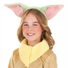 Get ready to channel the cuteness of Grogu with this officially licensed Grogu Ears Costume Headband! Based on the beloved character from the hit Star Wars series The Mandalorian, this headband is perfect for cosplay or for adding a fun touch to your Baby Yoda Halloween costume.The headband features two plush, green ears that are designed to resemble the adorable and iconic ears of Grogu, also known as Baby Yoda. The ears are attached to a sturdy plastic headband that is covered in soft fabric, Grogu Costume, Yoda Halloween Costume, Hotel Transylvania Costume, Yoda Halloween, Yoda Costume, Mandalorian Costume, Headband Costume, Doctor Who Costumes, Kiss Costume