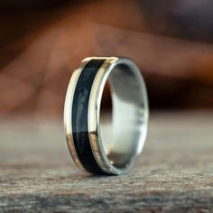 The Oxford Don | Men's Black Whiskey Barrel & Titanium Wedding Band with Dual Metal Inlays Whiskey Barrel Ring, Black Whiskey, Rustic Wedding Bands, Barrel Ring, Barrel Rings, Titanium Wedding Band, Titanium Ring, Cs Lewis, Jrr Tolkien