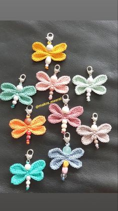 six crocheted dragonfly charms with beads